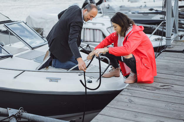 Two people on a boating port