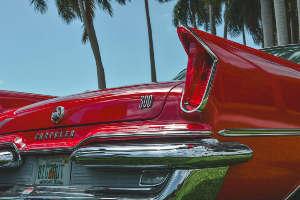 A red car with a specialty license plate