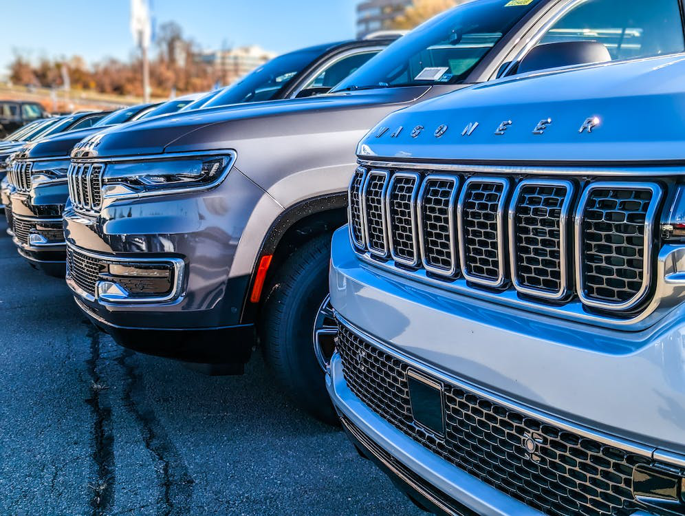 Close up of various cars standing in a row