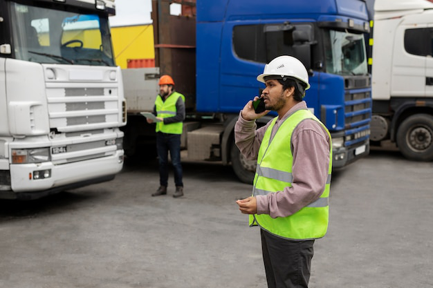 A fleet management professional taking a call