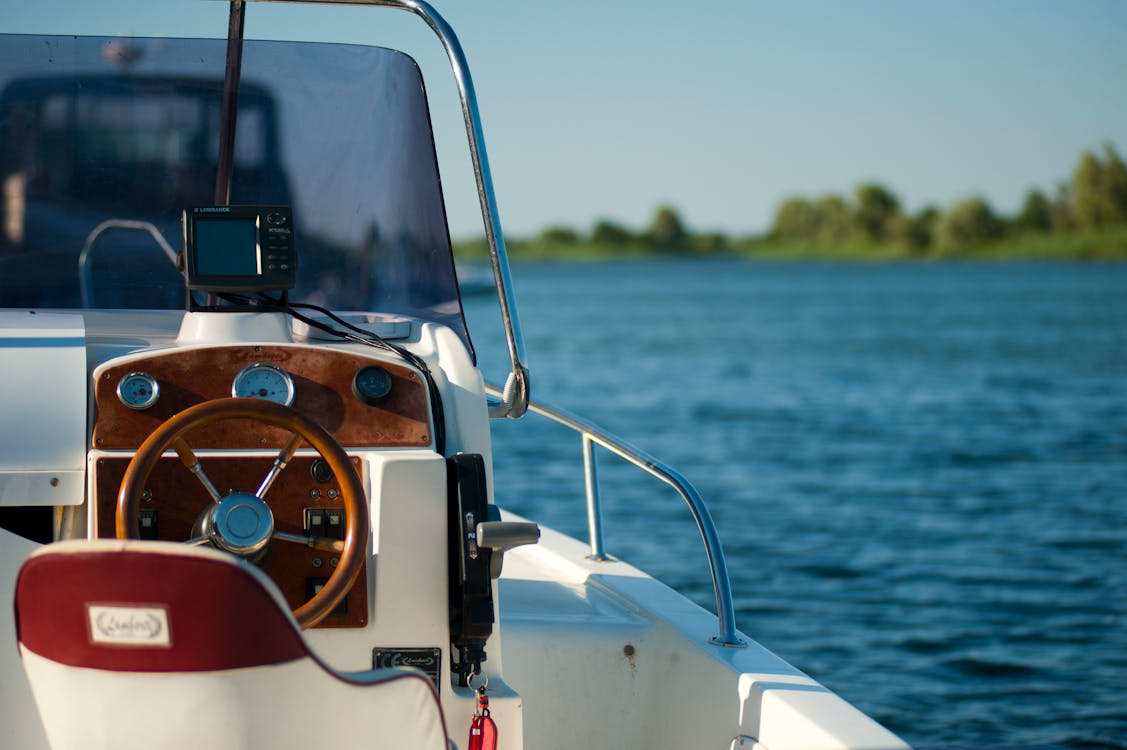 A white and brown boat