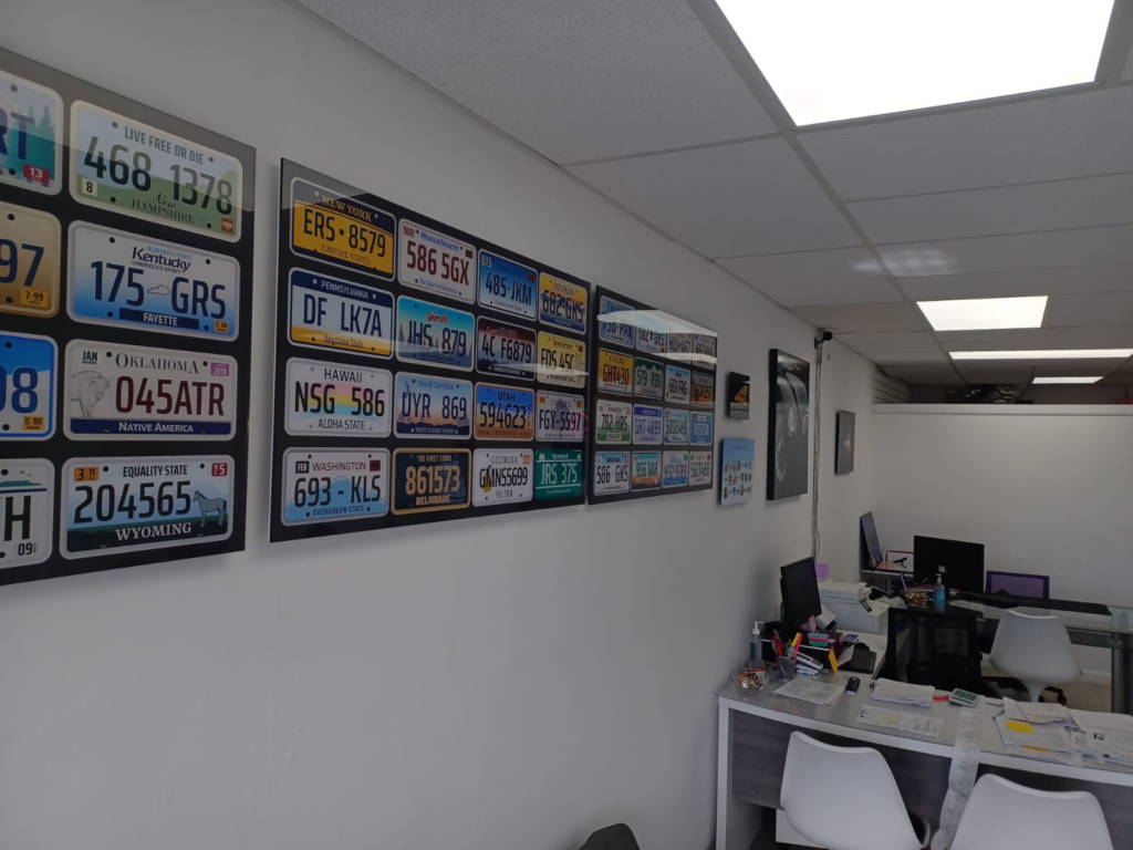 An auto tag agency's wall lined with Florida license plates