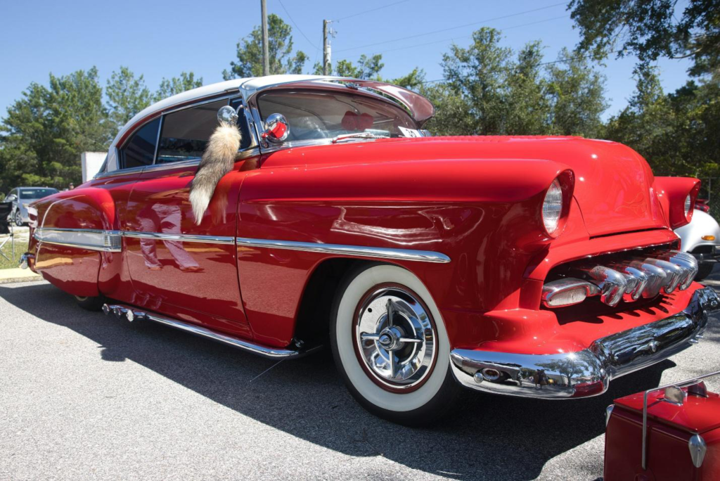 A red vintage car requiring a probate vehicle title transfer