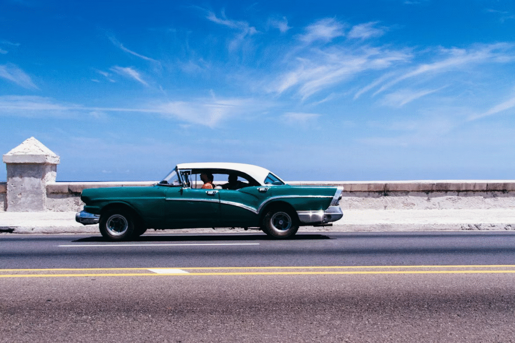 A green car on the road