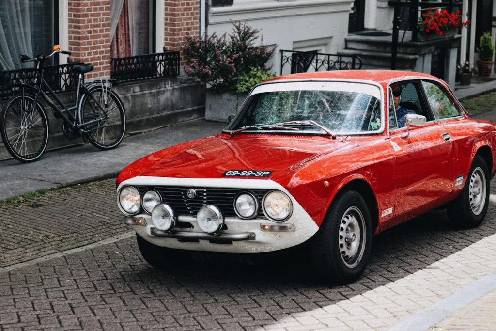A red and white car on the street