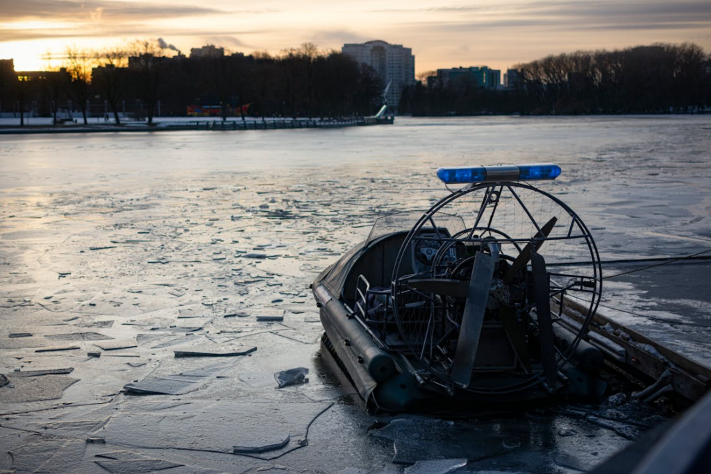 An airboat on the side of a water body