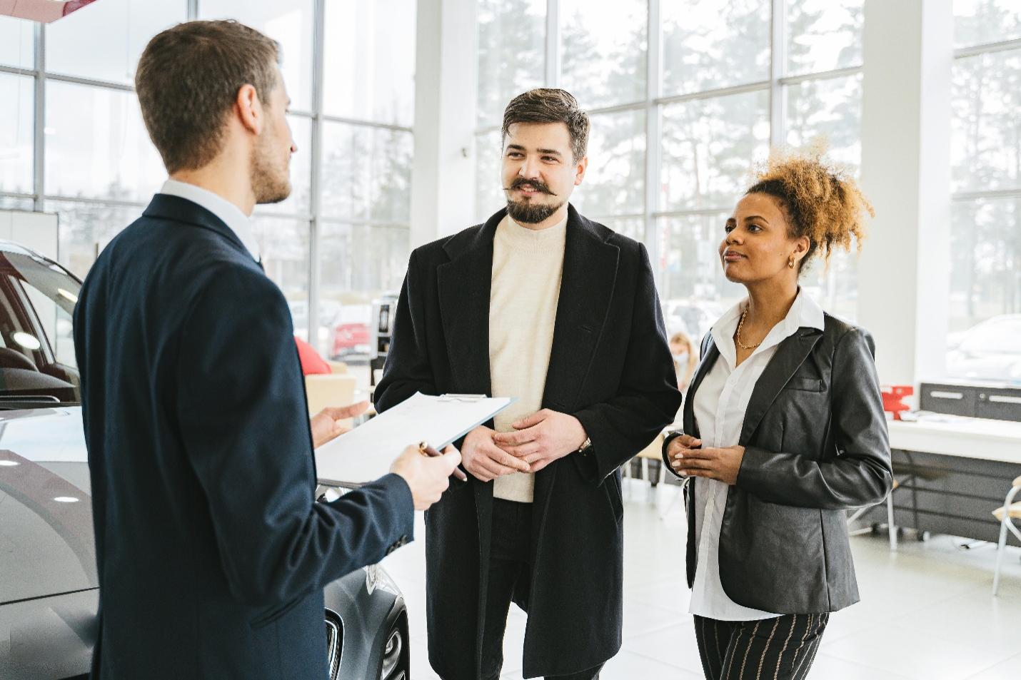 Two people talking to an agent