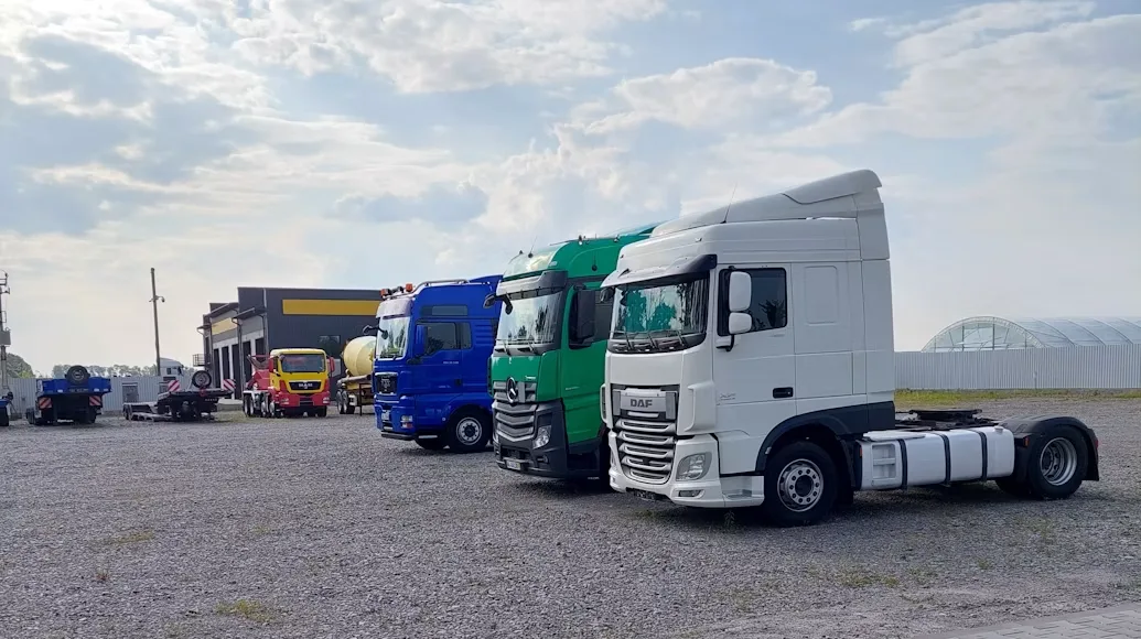 Trucks on an asphalt surface